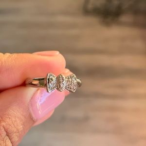 Bow tie fashion ring.